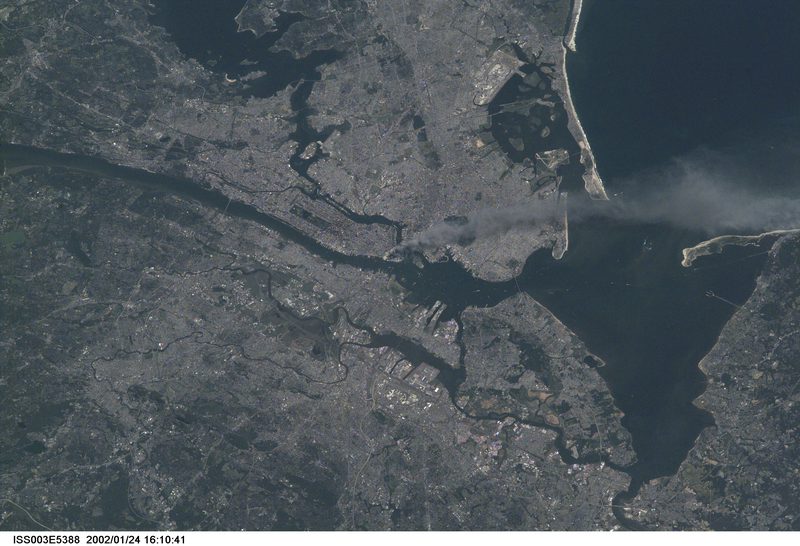 9/11 photograph of World Trade Centers pluming smoke