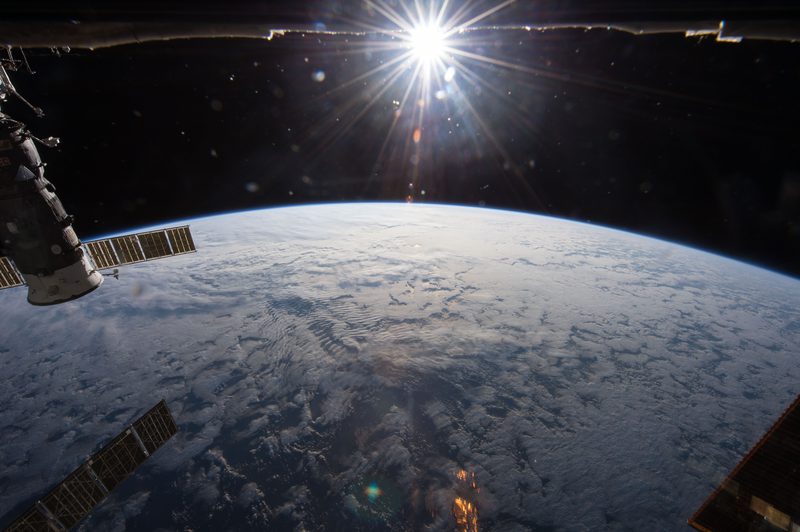 View of Earth and Sun from the International Space Station